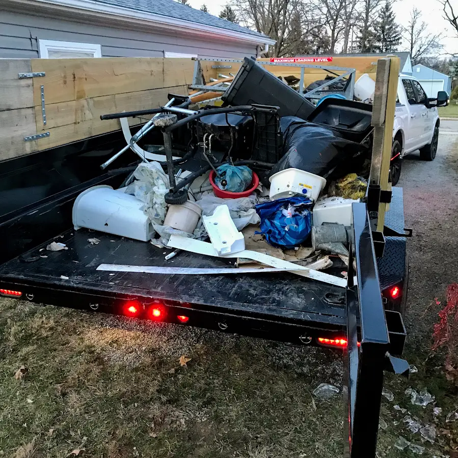 Roll-off dumpster delivered to a residential driveway in Plains
